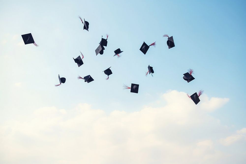 Graduation caps blue sky transportation. AI generated Image by rawpixel.