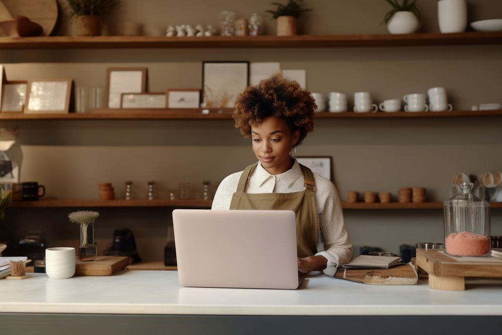 Black woman laptop computer small business.