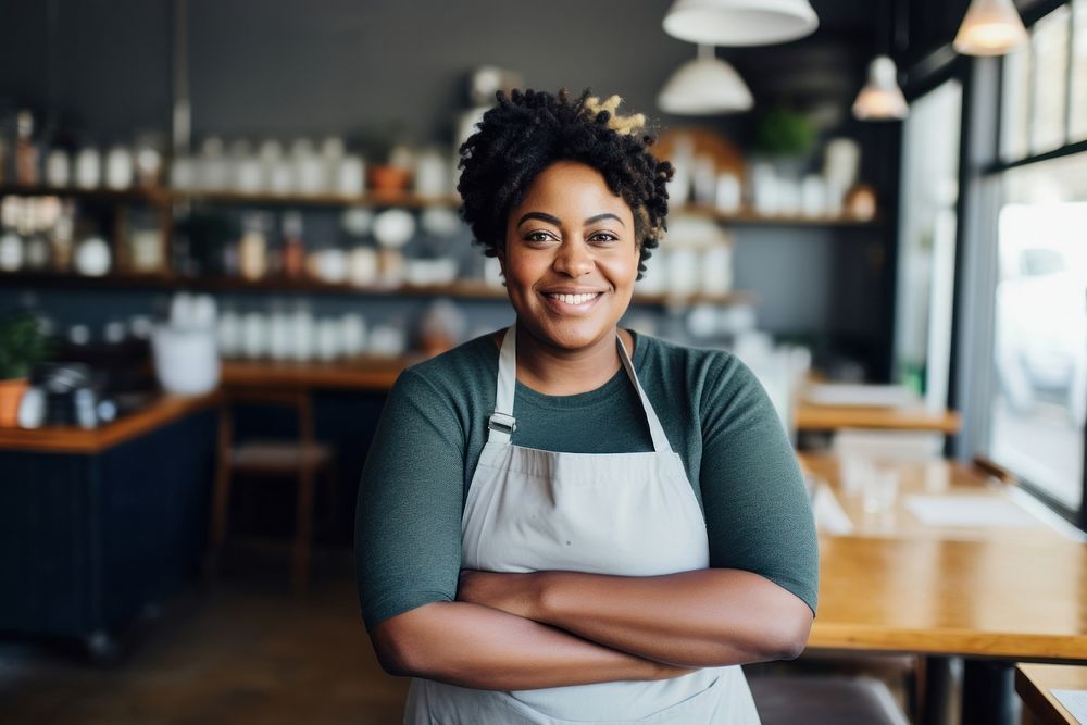 Chubby black female chef restaurant smiling adult.