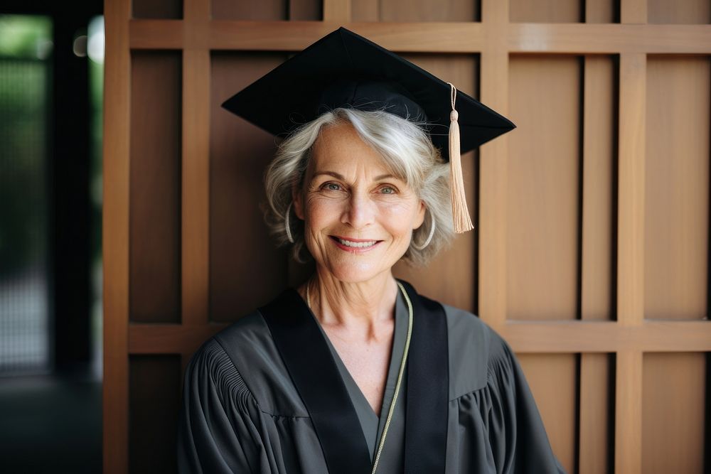 Mature female graduate graduation portrait adult. AI generated Image by rawpixel.