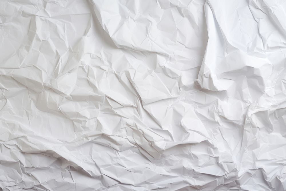 Recycled crumpled white paper backgrounds copy space wrinkled. AI generated Image by rawpixel.