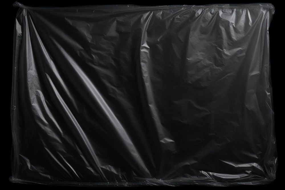 Vertical stretch plastic wrap black backgrounds black background.