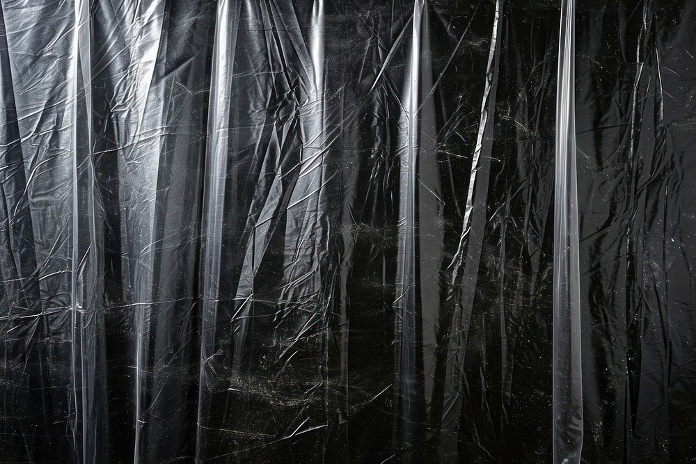 Vertical stretch plastic wrap backgrounds black monochrome.