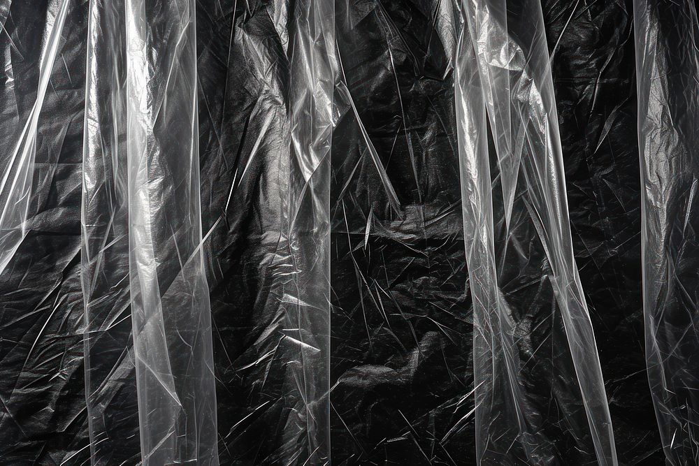Vertical stretch plastic wrap backgrounds black monochrome.