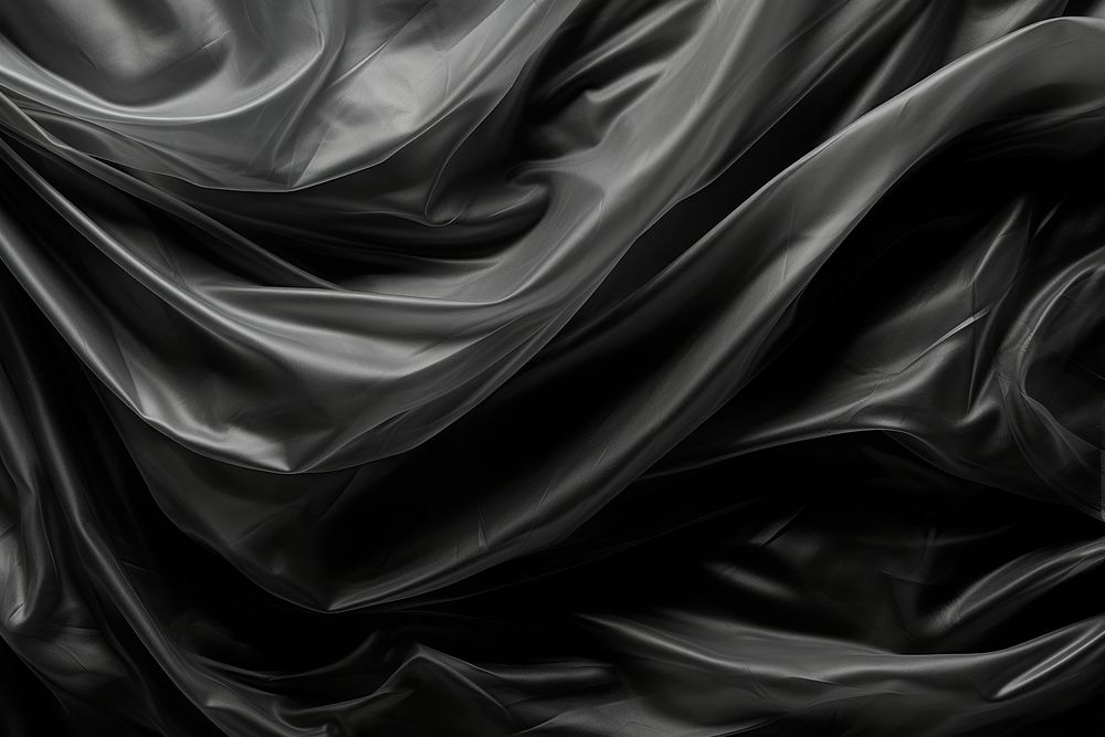 Flowing plastic wrap black backgrounds monochrome.