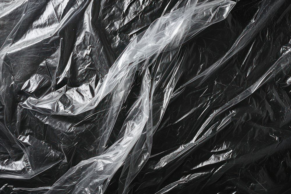 Layer plastic wrap backgrounds black monochrome.