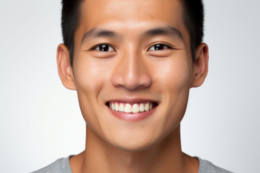 Close up south east asian man no make up smile skin white background.