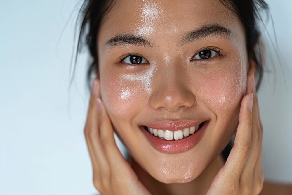 Southeast Asian woman no make up skin adult smile.