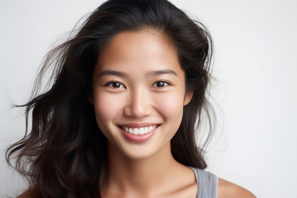 Close up Southeast Asian woman no make up smile adult skin.