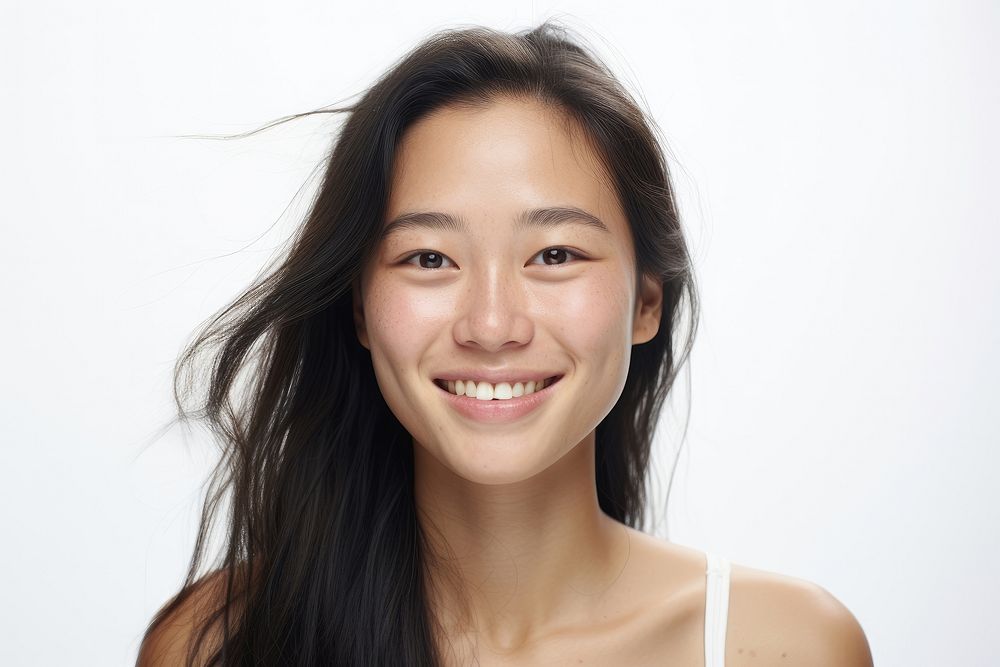 Southeast Asian woman no make up smile adult skin.