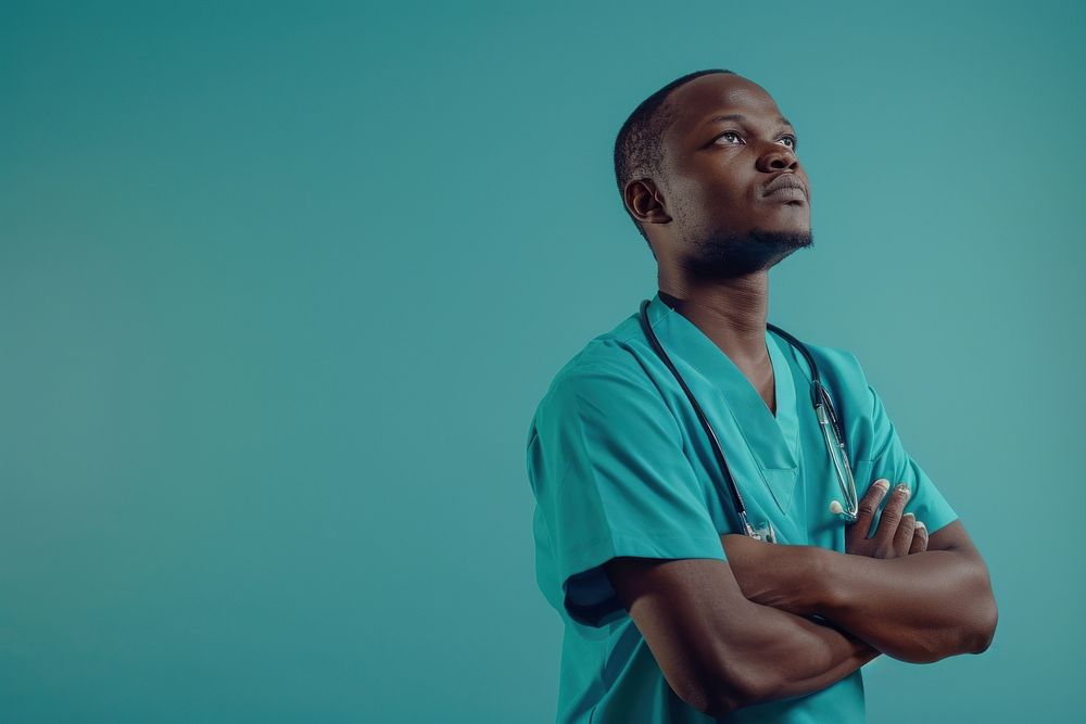 Photo of African Male doctor looking adult male.