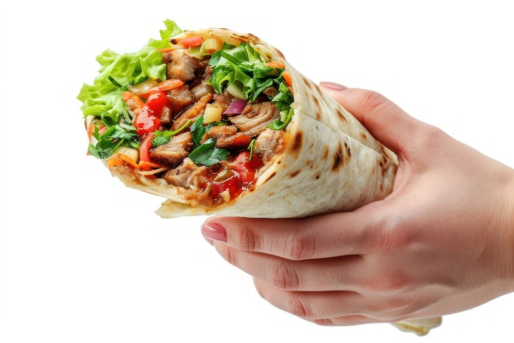Female hand holds shawarma with red sauce burrito bread food.