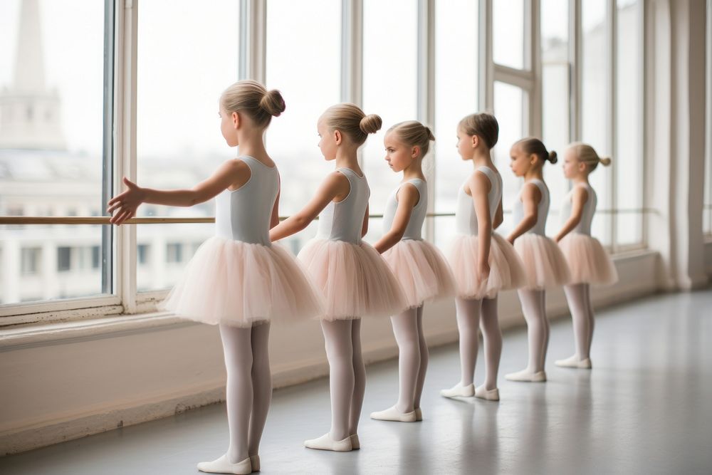 Little ballet students exercising in the barre dancing entertainment choreography. AI generated Image by rawpixel.