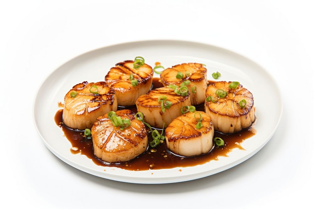 Seared bay scallops with garlic butter soy sauce plate food meat.