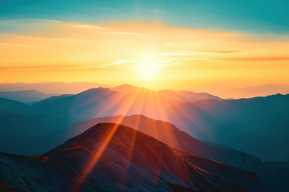 Photo of sunset behind a mountain sunlight sky backgrounds.