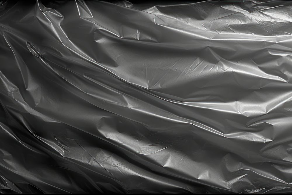 Sheeting of various sizes plastic wrap backgrounds abstract black.