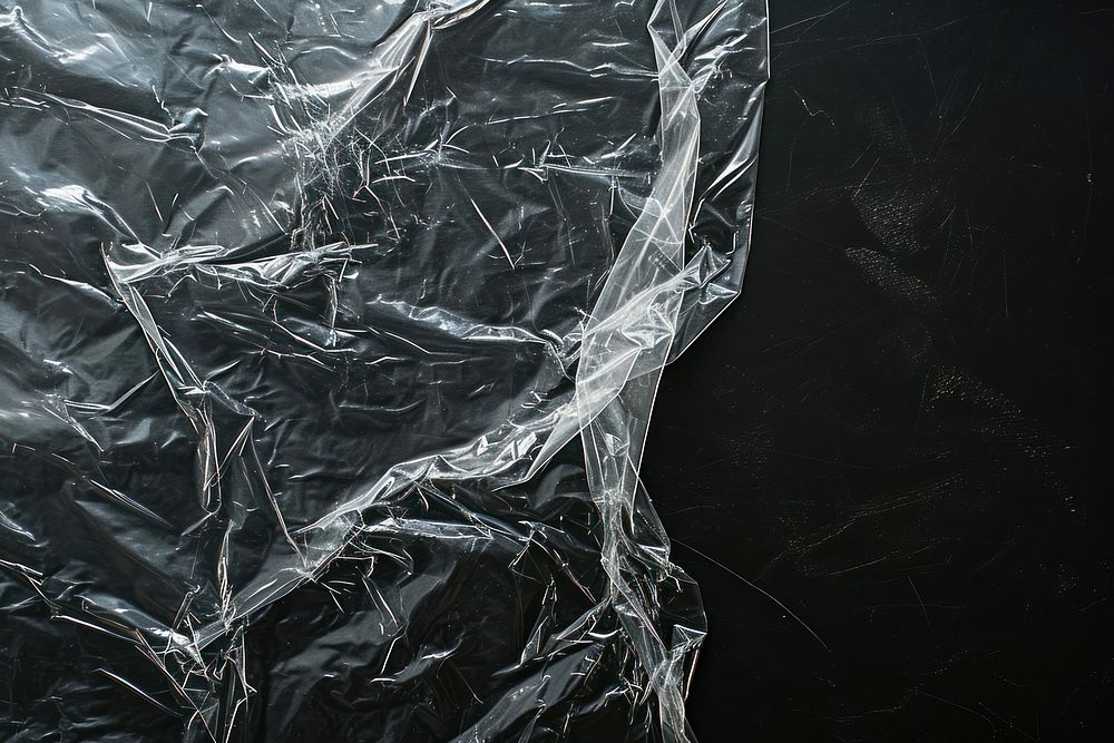 Simple plane plastic wrap backgrounds blackboard black background.