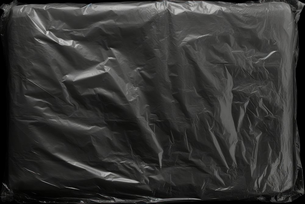Simple plastic wrap black backgrounds black background.