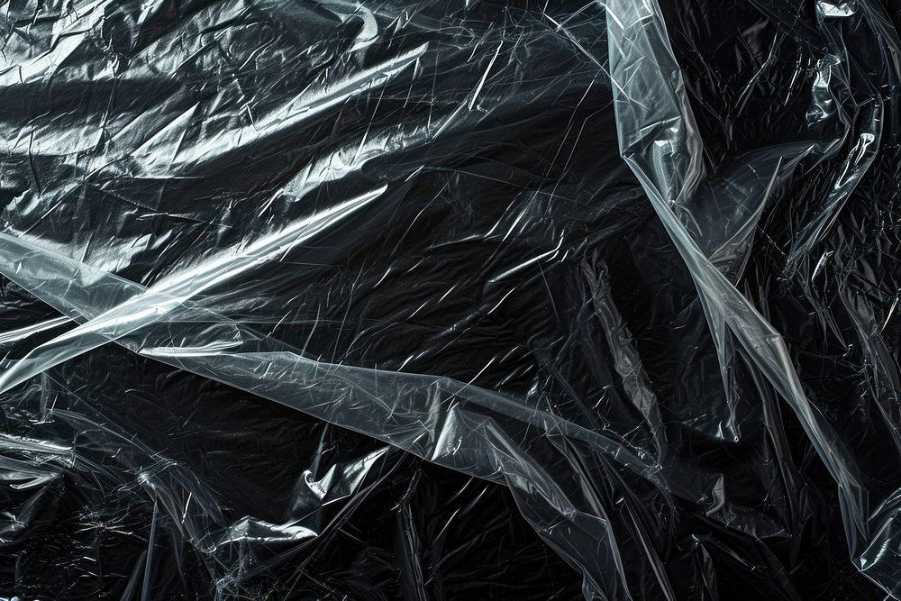Stretching backgrounds black plastic wrap.
