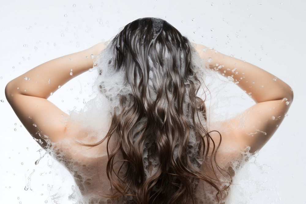 Woman shampoo foam on her hair washing bathing adult.