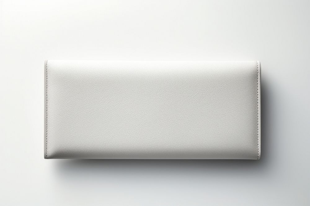 White leather long wallet  white background accessories simplicity.
