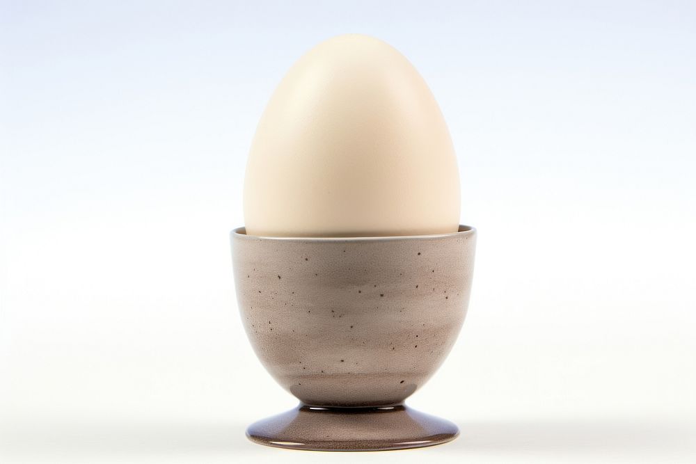 Pottery off-white Egg cup egg food.
