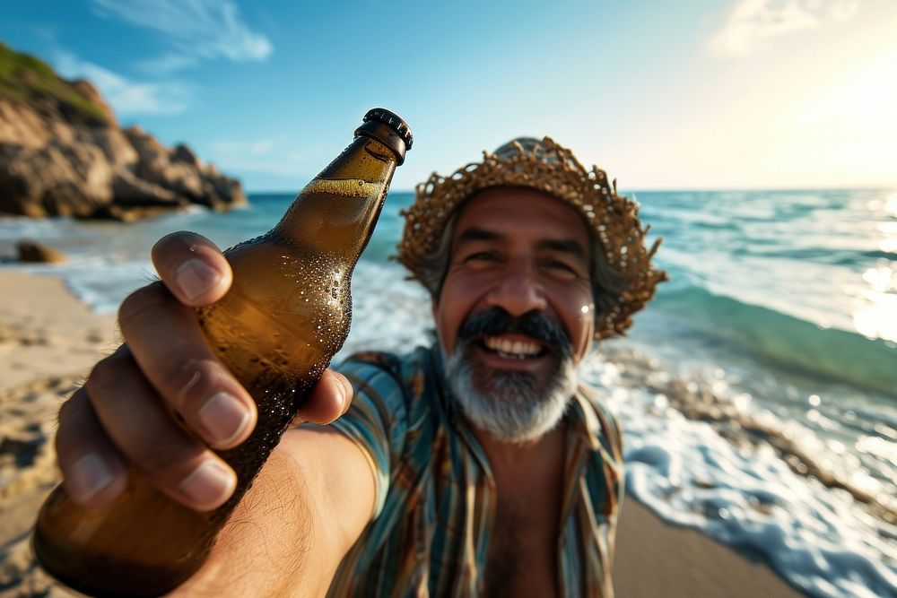 Selfie Latino man holding a beer bottle on a beach portrait outdoors vacation. AI generated Image by rawpixel.