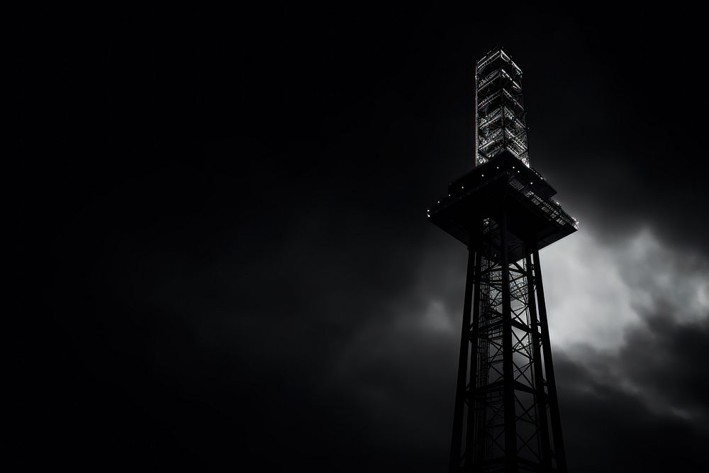Dark background tower architecture monochrome.