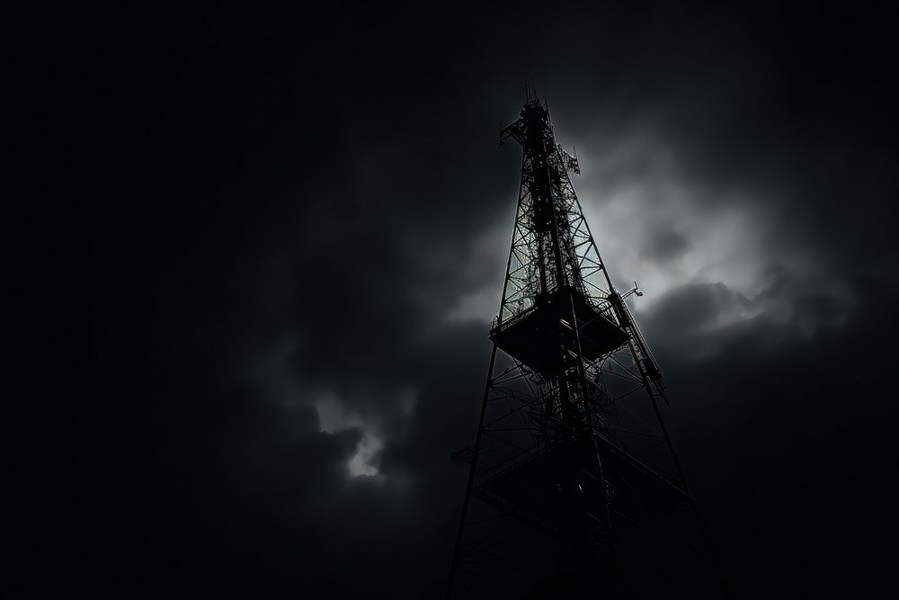 Dark background monochrome outdoors tower.