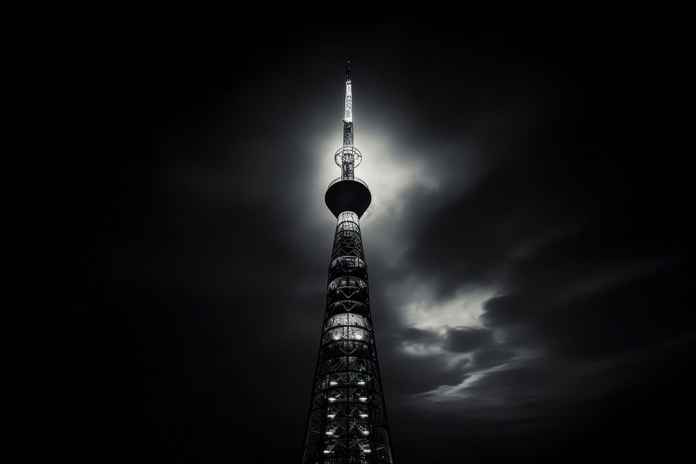 Dark background tower architecture monochrome.