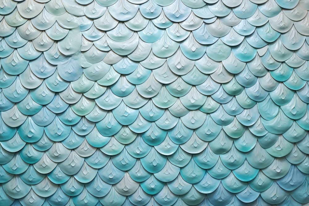 Fish scale bas relief pattern wall art architecture.