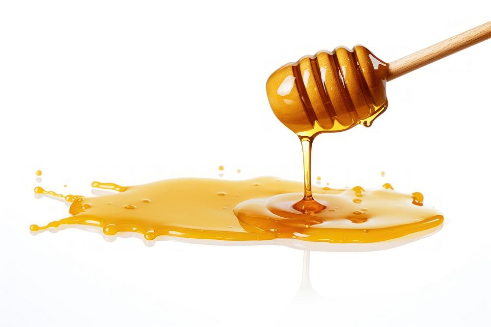 Honey dripping honey white background freshness.