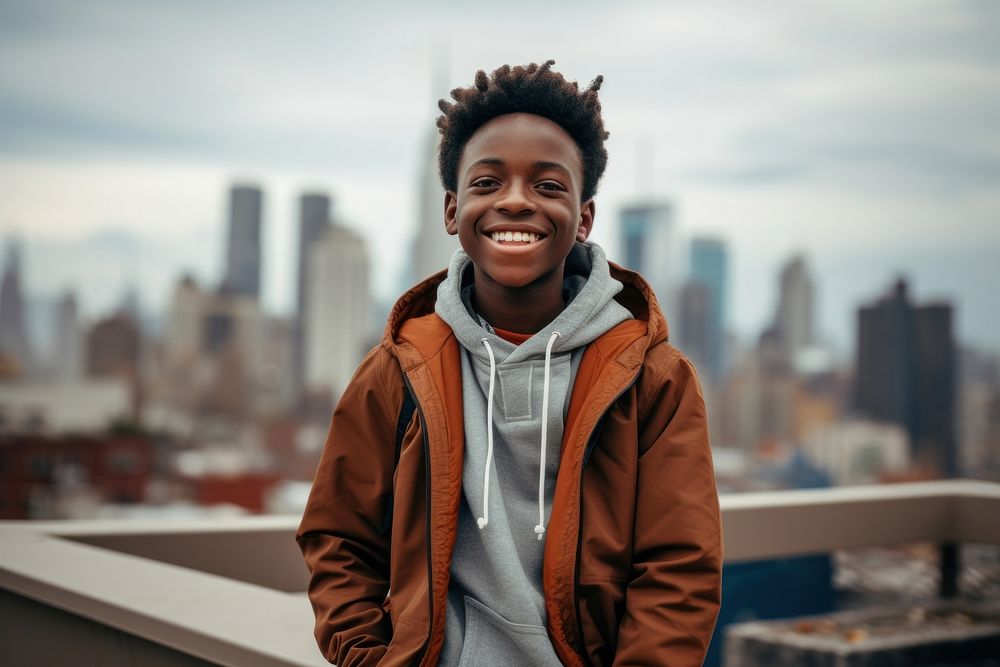 African boy wearing casual attire portrait standing smiling.