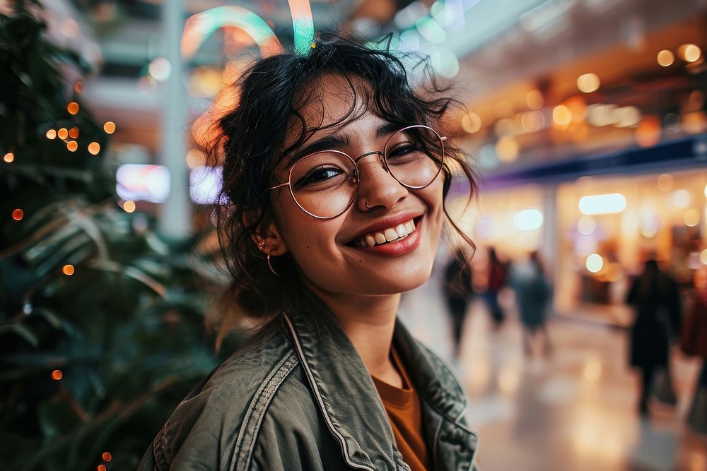 Happy latina in shopping mall portrait glasses adult. AI generated Image by rawpixel.
