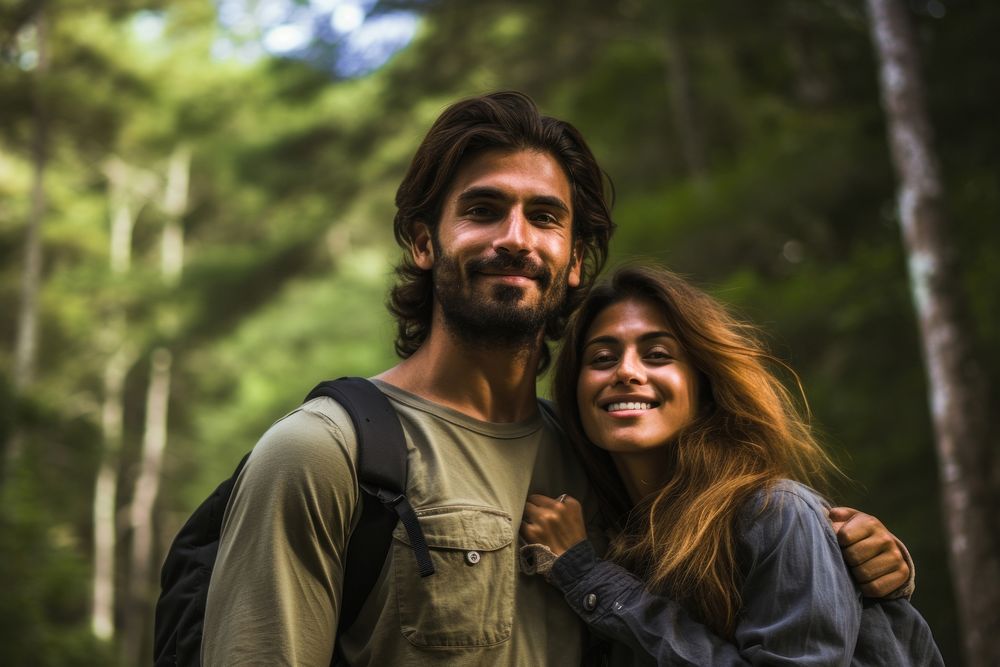 Hispanic Argentinian couple forest portrait outdoors.