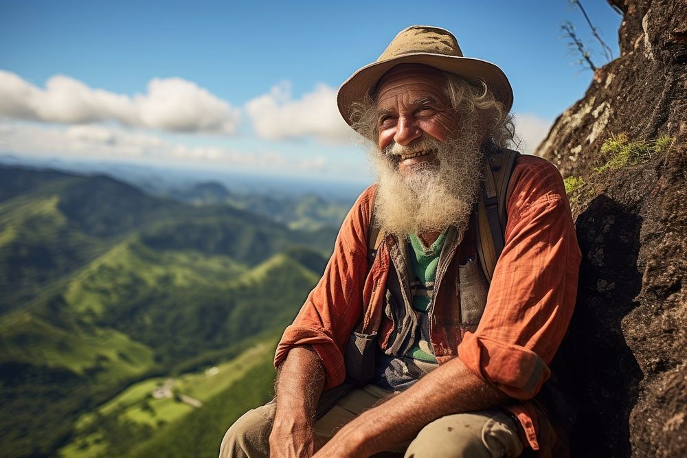 Latina brazilian senior man mountain portrait outdoors.