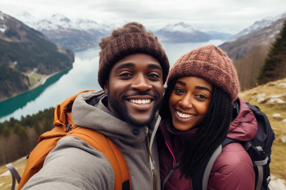 African couple traveler taking a selfie hiking smile adult.