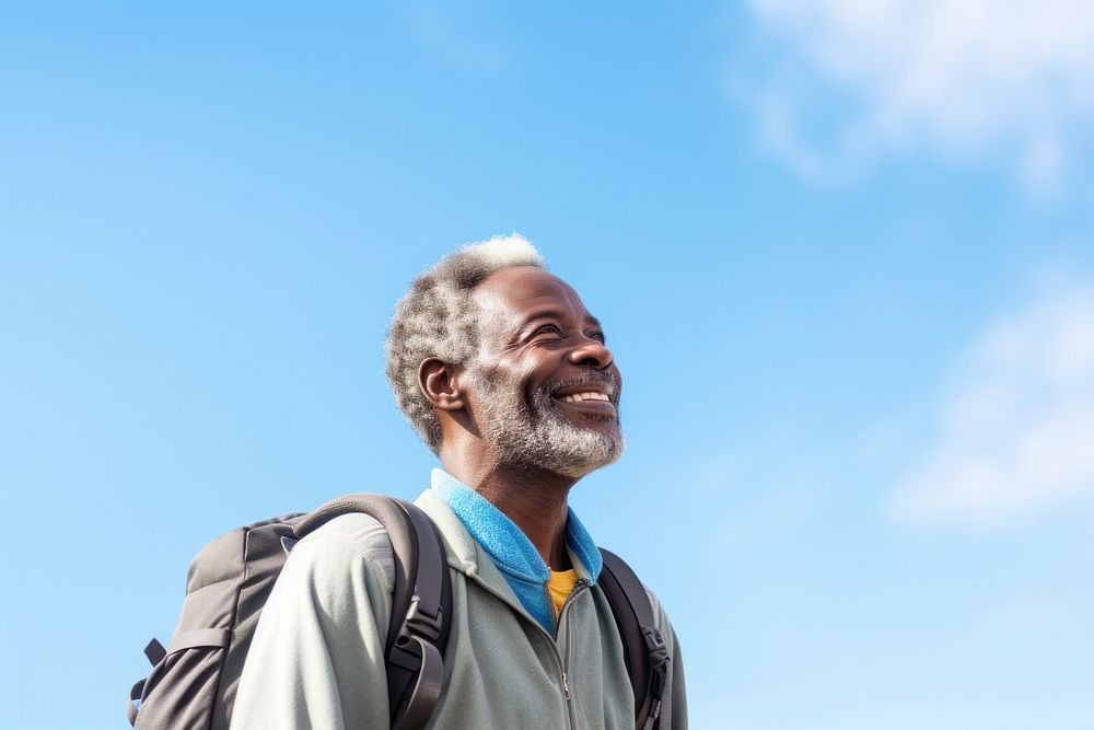 African senior man hiking backpack adult smile.