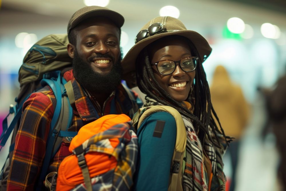 Ghanan couple backpacker at the airport portrait glasses adult.