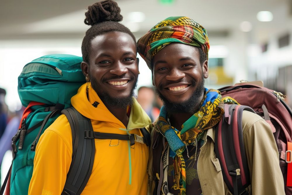 Ghanan couple backpacker at the airport adult smile scarf.