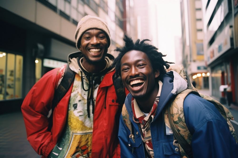 Two African people Backpackers in tokyo laughing outdoors adult.