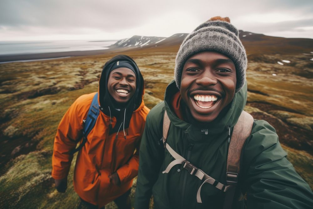 African Backpackers in iceland outdoors adventure laughing.