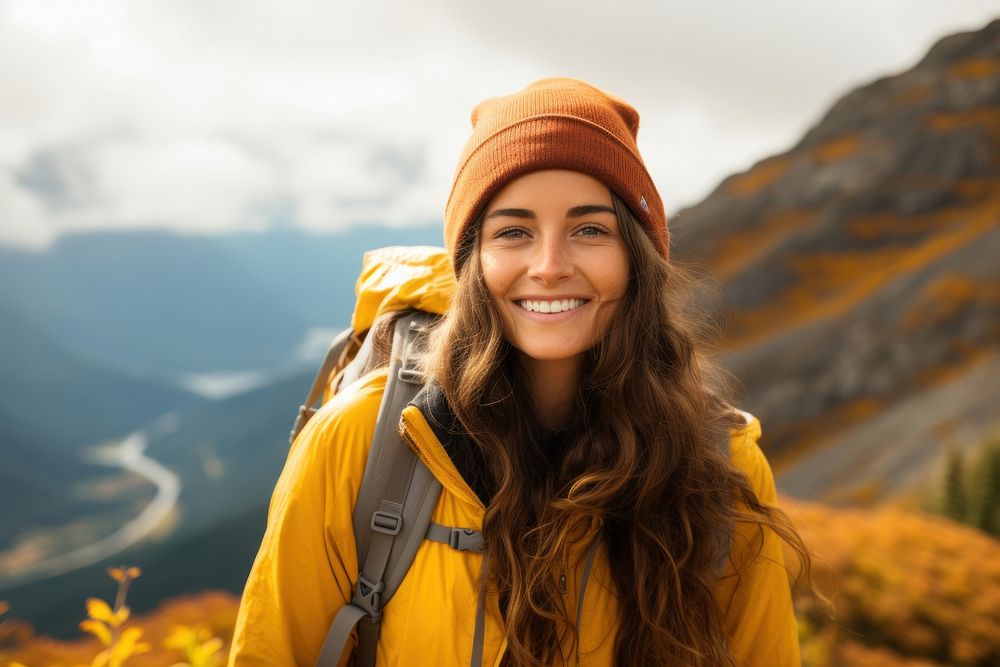 Woman hiking adventure mountain portrait.