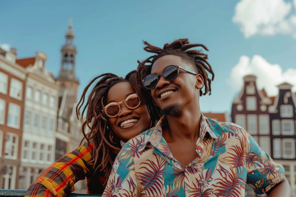 Kenyan couple sightseeing in europe laughing glasses adult.