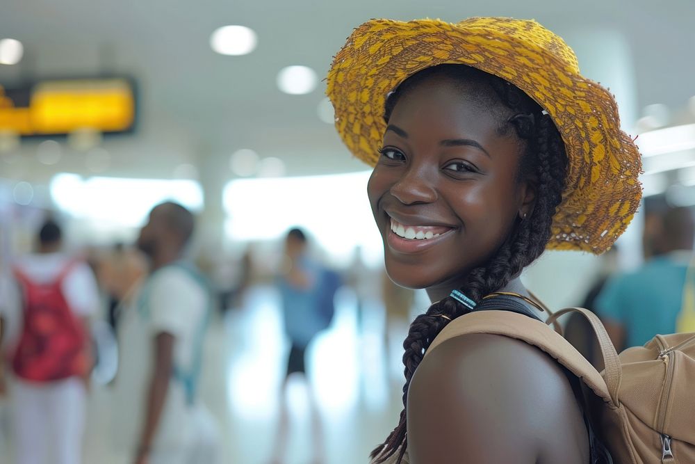 Nigerian girl backpacker at the airport smile happy architecture.