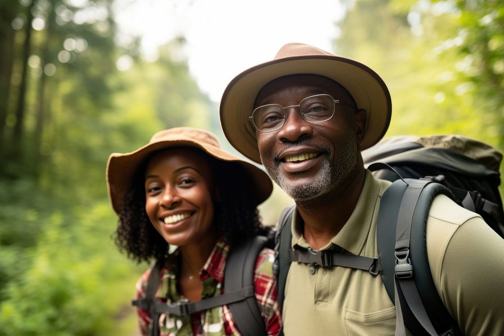 African middle age couple With Backpack backpack backpacking recreation.