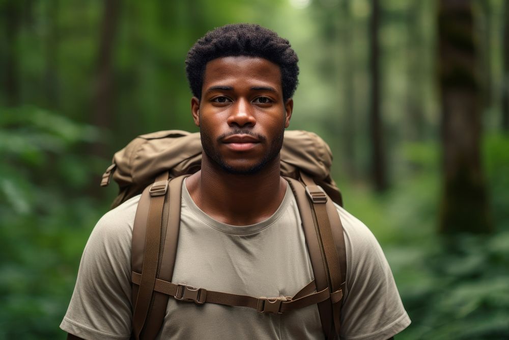 African young man With Backpack portrait backpack forest.