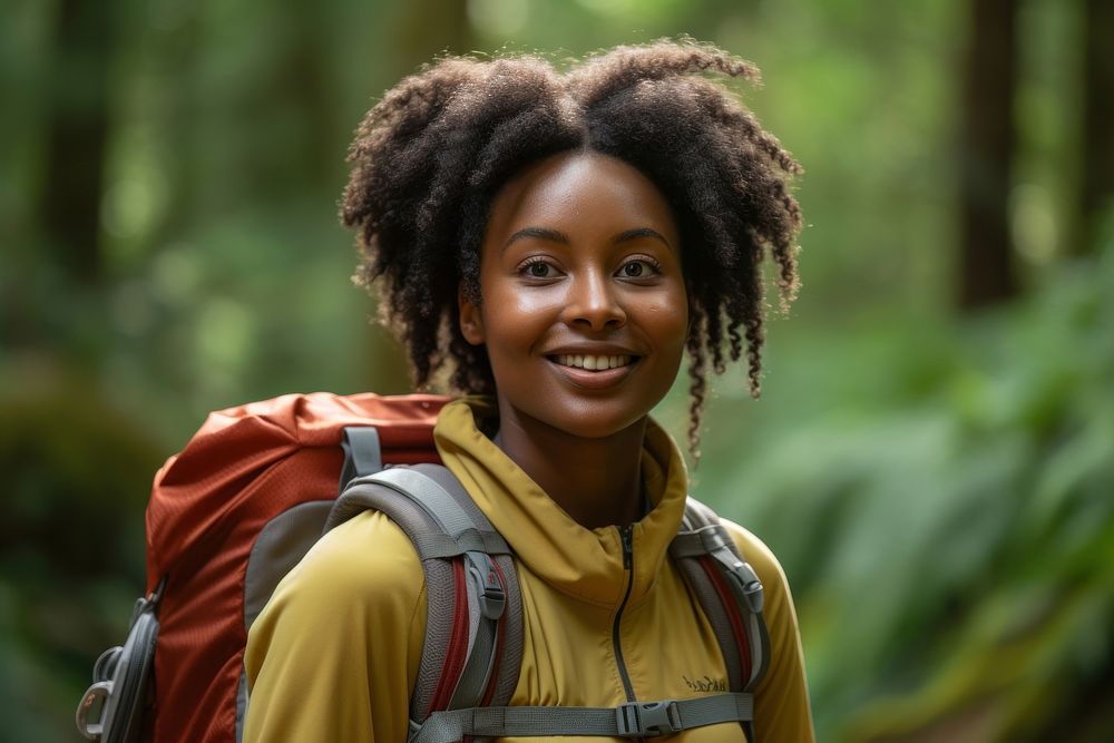 African young woman With Backpack backpack portrait forest.
