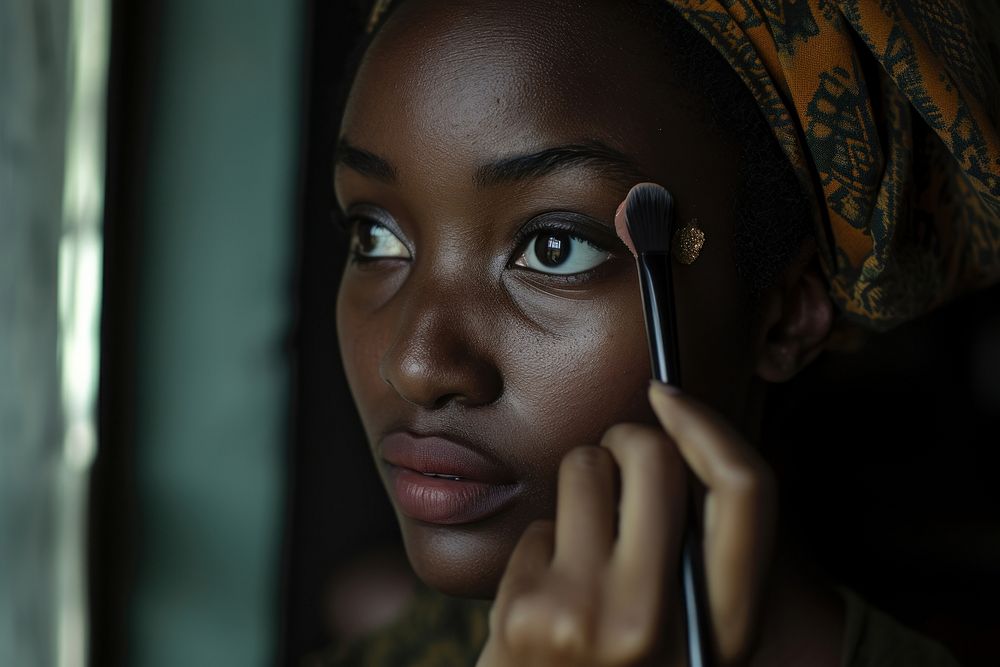 Black South African woman makeup medication cosmetics.