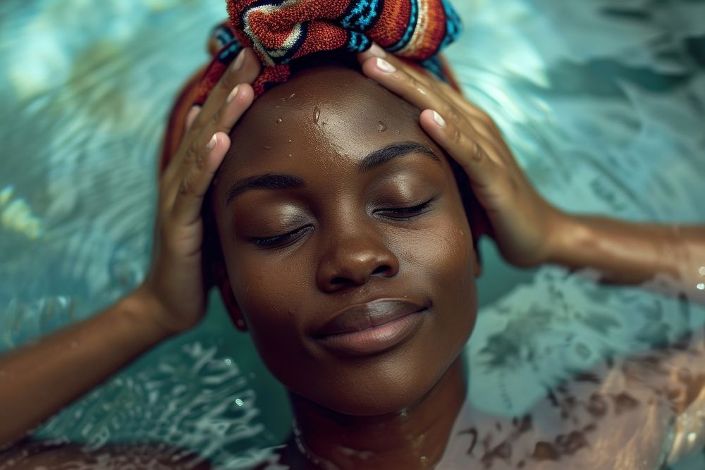 Ghanan woman skin dreadlocks relaxation.